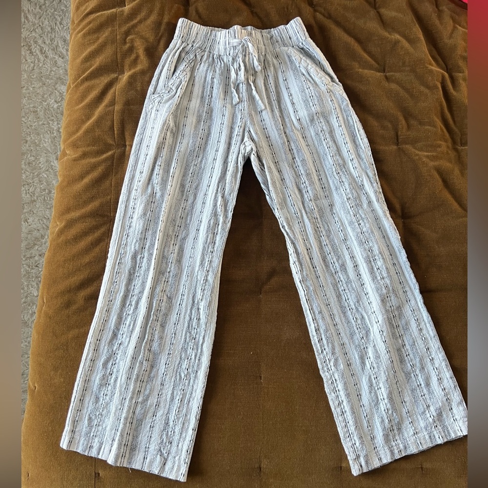 Black and white bathing suit cover up wide legged pants.